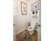 Cozy half bathroom featuring stylish decor and a modern toilet at 1608 Rock Ridge Pl, North Las Vegas, NV 89084