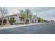 Charming modern homes with well-manicured landscaping line a quiet residential street at 1608 Rock Ridge Pl, North Las Vegas, NV 89084