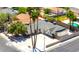 An aerial view showcases the home's layout, landscaping, and private pool in the backyard at 1700 Ivanhoe Way, Las Vegas, NV 89102