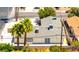 An aerial perspective of the home reveals a well-kept backyard, trees, and a serene neighborhood setting at 1700 Ivanhoe Way, Las Vegas, NV 89102