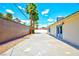 Spacious backyard with a covered patio and block wall, perfect for entertaining at 1700 Ivanhoe Way, Las Vegas, NV 89102