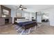 Cozy bedroom featuring a fireplace, unique decor, and a mirrored closet that amplifies the space at 1700 Ivanhoe Way, Las Vegas, NV 89102