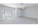 The bright bedroom features a ceiling fan, and lots of floor space at 1700 Ivanhoe Way, Las Vegas, NV 89102