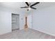 Large bedroom with large closet, ceiling fan and carpeting at 1700 Ivanhoe Way, Las Vegas, NV 89102