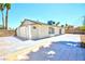A view of the backyard with exterior of the house at 1700 Ivanhoe Way, Las Vegas, NV 89102