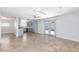 An expansive living room showcases an open floor plan and a seamless transition into the updated kitchen at 1700 Ivanhoe Way, Las Vegas, NV 89102