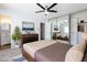 Spacious main bedroom with mirrored closet doors and open access to the ensuite bath at 1700 Ivanhoe Way, Las Vegas, NV 89102