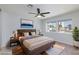 Serene main bedroom featuring a ceiling fan and bright window at 1700 Ivanhoe Way, Las Vegas, NV 89102