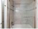 Tiled shower with glass doors and decorative accents, providing a sleek design at 1700 Ivanhoe Way, Las Vegas, NV 89102