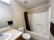 Bathroom featuring tub-shower, toilet and sink with vanity and mirror at 2072 Mesquite Ln # 102, Laughlin, NV 89029