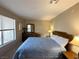 Cozy bedroom with queen bed, dresser with mirror, and window with blind at 2072 Mesquite Ln # 102, Laughlin, NV 89029