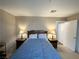 Comfortable bedroom with queen bed, neutral-colored walls, and bedside tables at 2072 Mesquite Ln # 102, Laughlin, NV 89029