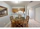 A well-lit dining area features a stone-topped table and complements the nearby kitchen at 2072 Mesquite Ln # 102, Laughlin, NV 89029