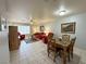 Open floor plan showing living and dining room with tile flooring at 2072 Mesquite Ln # 102, Laughlin, NV 89029