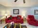 A comfortable living room features plush seating and stylish decor under a ceiling fan at 2072 Mesquite Ln # 102, Laughlin, NV 89029