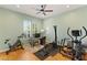 Bright workout room with exercise bike, weights and hardwood floors at 215 Great Gable Dr, Las Vegas, NV 89183