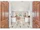 Open foyer with view into the living spaces and backyard pool that creates a bright and welcoming atmosphere at 215 Great Gable Dr, Las Vegas, NV 89183