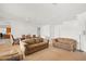 Bright and airy living room with comfortable seating, open layout and neutral tones creating a relaxing atmosphere at 215 Great Gable Dr, Las Vegas, NV 89183