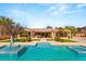 Beautiful backyard with pool and a patio perfect for outdoor entertainment and leisure at 215 Great Gable Dr, Las Vegas, NV 89183