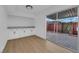 Bright kitchen with built-in cabinets overlooks a private patio through sliding glass doors at 241 E Van Wagenen St, Henderson, NV 89015