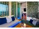 Inviting balcony featuring comfortable seating, stylish decor, and ambient string lights at 2700 Las Vegas Blvd # 1401, Las Vegas, NV 89109