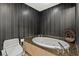 Stylish bathroom with luxurious marble enclosed tub and modern fixtures at 2700 Las Vegas Blvd # 1401, Las Vegas, NV 89109