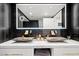 Dual vessel sinks and marble countertops create a luxurious bathroom at 2700 Las Vegas Blvd # 1401, Las Vegas, NV 89109