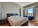 Bright bedroom boasts hardwood floors and large windows with scenic views at 2700 Las Vegas Blvd # 1401, Las Vegas, NV 89109