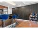 View of the kitchen bar with hardwood floors and textured wall behind it at 2700 Las Vegas Blvd # 1401, Las Vegas, NV 89109
