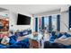 Comfortable living room with modern decor, skyline view, and hardwood flooring at 2700 Las Vegas Blvd # 1401, Las Vegas, NV 89109