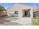 Rear exterior showcasing a cozy patio and xeriscape landscaping at 2839 Strathallan Ave, Henderson, NV 89044