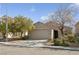 Inviting single-Gathering home with desert landscaping, a two-car garage, and a neutral-toned exterior at 2839 Strathallan Ave, Henderson, NV 89044