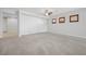 Expansive living room with neutral paint, carpet, and modern ceiling fan at 2839 Strathallan Ave, Henderson, NV 89044