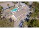 Aerial showcases sparkling pool with outdoor seating and home with horse facilities at 2900 Thurman Ave, Las Vegas, NV 89120