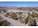 Aerial view of expansive home with large lot, pool and mature landscaping, set against the Las Vegas skyline at 2900 Thurman Ave, Las Vegas, NV 89120