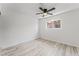Cozy bedroom with natural light, ceiling fan, and wood-look floors at 2915 Cedar Ave # 12C, Las Vegas, NV 89101