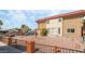 Exterior of a multi-Gathering residence featuring desert landscaping and a red-tiled roof at 2915 Cedar Ave # 12C, Las Vegas, NV 89101