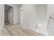 Upstairs hallway with light colored floors and white trim at 2915 Cedar Ave # 12C, Las Vegas, NV 89101
