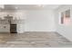 Bright kitchen with white cabinets, stainless steel appliances, and modern countertops at 2915 Cedar Ave # 12C, Las Vegas, NV 89101