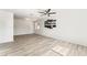 Spacious living room with new flooring, a ceiling fan, and fresh paint at 2915 Cedar Ave # 12C, Las Vegas, NV 89101