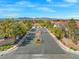 Aerial view of the community entrance, showcasing the landscaping and gated access to the neighborhood at 3023 Sunrise Bay Ave, North Las Vegas, NV 89031