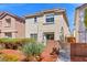 Charming two-story home features a well-maintained front yard and gated entrance at 3023 Sunrise Bay Ave, North Las Vegas, NV 89031