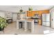 Open concept kitchen featuring granite counters, stainless appliances, and easy access to dining area at 3023 Sunrise Bay Ave, North Las Vegas, NV 89031