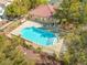 Aerial view of the community pool with lounge chairs, offering a relaxing recreation area at 3023 Sunrise Bay Ave, North Las Vegas, NV 89031