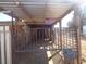 This exterior shot shows an open barn with gated fencing at 3127 Aloha Ave, Las Vegas, NV 89121