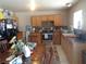 A practical kitchen area is visible, featuring wooden cabinets and a black refrigerator at 3127 Aloha Ave, Las Vegas, NV 89121