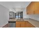 Kitchen with granite countertops, stainless steel appliances and an island sink at 353 E Bonneville Ave # 183/283, Las Vegas, NV 89101