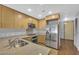 A view of a kitchen featuring stainless steel appliances and granite countertops at 353 E Bonneville Ave # 183/283, Las Vegas, NV 89101