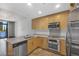 Well-equipped kitchen with stainless steel appliances and granite countertops at 353 E Bonneville Ave # 183/283, Las Vegas, NV 89101