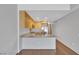 Well-equipped kitchen with stainless steel appliances, island and wood floor at 353 E Bonneville Ave # 183/283, Las Vegas, NV 89101